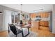 Eat in kitchen featuring modern lighting and sliding doors at 1188 Mulberry Ln, Highlands Ranch, CO 80129