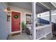 Inviting front porch featuring stylish seating, a decorative wreath, and a welcoming entrance at 1188 Mulberry Ln, Highlands Ranch, CO 80129