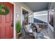 Relaxing front porch with comfortable seating and a charming, welcoming atmosphere at 1188 Mulberry Ln, Highlands Ranch, CO 80129