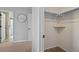 View of a closet and bathroom from a hallway at 1188 Mulberry Ln, Highlands Ranch, CO 80129