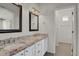 Bathroom features granite countertops, dual sinks, and modern vanity at 200 Whitehaven Cir, Highlands Ranch, CO 80129