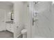 Modern bathroom features a walk-in shower with a sleek tile surround at 200 Whitehaven Cir, Highlands Ranch, CO 80129