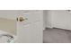 Bathroom features a white tub, bronze fixtures, and ceramic tile flooring at 200 Whitehaven Cir, Highlands Ranch, CO 80129