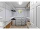 Walk-in closet with multiple racks and shelves for optimal storage at 12671 Home Farm Ln, Westminster, CO 80234