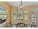 Bright breakfast nook with windows offering ample light and views to the landscaped yard at 12671 Home Farm Ln, Westminster, CO 80234