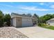 Charming single-Gathering home featuring a 2-car garage and well-manicured landscaping at 12671 Home Farm Ln, Westminster, CO 80234