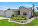 Charming single-Gathering home showcasing well-maintained landscaping, a brick exterior, and an attached two car garage at 12671 Home Farm Ln, Westminster, CO 80234