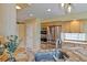 Bright kitchen features stainless steel appliances, granite countertops, and ample cabinet space at 12671 Home Farm Ln, Westminster, CO 80234