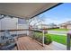 Cozy front porch with seating, perfect for enjoying the neighborhood views at 7927 Elmwood St, Littleton, CO 80125