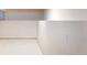 Unfinished basement with white walls and visible electrical outlets, ready for customization at 3469 Benton St, Wheat Ridge, CO 80212