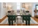 Bright and airy living room furnished with a modern sofa, hardwood floors and stylish décor at 3469 Benton St, Wheat Ridge, CO 80212