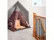 Attic living space with a tent and light gray walls at 3425 W 34Th Ave, Denver, CO 80211