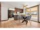 Eat-in kitchen area featuring stainless steel appliances and sliding glass doors to the backyard at 8610 E Eastman Ave, Denver, CO 80231