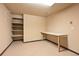 Basement storage area with a built-in workbench and shelving at 8610 E Eastman Ave, Denver, CO 80231