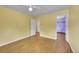 Bright bedroom with wood floors and a view to the closet offers plenty of storage at 3145 S Bryant St, Englewood, CO 80110