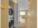 Convenient laundry area with modern washer and dryer, storage, and easy access to other living spaces at 3145 S Bryant St, Englewood, CO 80110