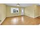 Inviting living room with hardwood floors and bright natural light perfect for welcoming guests at 3145 S Bryant St, Englewood, CO 80110