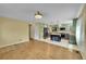 Bright living room with hardwood floors that seamlessly flows into the kitchen and adjacent areas at 3145 S Bryant St, Englewood, CO 80110