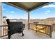 Cozy covered balcony with mountain views, perfect for enjoying outdoor dining at 17949 W 94Th Dr, Arvada, CO 80007