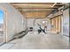 Spacious unfinished basement with walkout access, offering ample natural light and potential living space at 17949 W 94Th Dr, Arvada, CO 80007