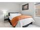 Comfortable bedroom with a cozy bed and stylish decor at 17949 W 94Th Dr, Arvada, CO 80007