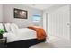 Comfortable bedroom with a cozy bed and closet at 17949 W 94Th Dr, Arvada, CO 80007