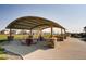 Community outdoor seating area with covered shelter, ideal for socializing and enjoying the outdoors at 17949 W 94Th Dr, Arvada, CO 80007