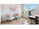 Cozy home office with natural light and views of the neighborhood at 17949 W 94Th Dr, Arvada, CO 80007