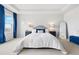 Spacious main bedroom with plush carpeting, large windows, and a tray ceiling at 17949 W 94Th Dr, Arvada, CO 80007