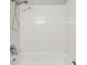 Clean, tiled tub and shower combo at 857 S Van Gordon Ct # B107, Lakewood, CO 80228