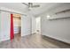 The bedroom features a closet, overhead lighting, and an entry to the bathroom at 857 S Van Gordon Ct # B107, Lakewood, CO 80228