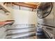 Closet with in-unit washer and dryer hookups and shelving at 857 S Van Gordon Ct # B107, Lakewood, CO 80228