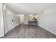 Open living area flows to the kitchen with stylish flooring, and plenty of room to entertain at 857 S Van Gordon Ct # B107, Lakewood, CO 80228