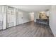 Open layout with dining area, kitchen, and contemporary flooring makes this space inviting and functional at 857 S Van Gordon Ct # B107, Lakewood, CO 80228