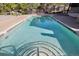 Close up view of the swimming pool with steps leading into it on a sunny day at 857 S Van Gordon Ct # B107, Lakewood, CO 80228