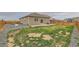 Wide backyard featuring a patio, lawn and wood fence, providing a versatile outdoor space at 1888 Ruby Ct, Brighton, CO 80603