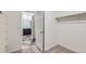 Walk-in closet featuring a closet rod for hanging clothes with carpet flooring at 1888 Ruby Ct, Brighton, CO 80603