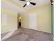 Large bedroom with carpet flooring and access to bathroom at 17346 Nature Walk Trl # 108, Parker, CO 80134