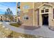 Exterior view of building with walkway and landscaping at 17346 Nature Walk Trl # 108, Parker, CO 80134
