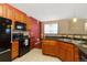Well-equipped kitchen with granite countertops and modern appliances at 17346 Nature Walk Trl # 108, Parker, CO 80134