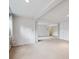 Spacious finished basement with neutral carpet, white walls, and recessed lighting at 2653 S Harrington Ln, Lakewood, CO 80227
