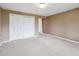 Bedroom with carpet, a closet and a doorway leading to another room at 2653 S Harrington Ln, Lakewood, CO 80227