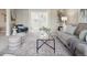 Inviting living room featuring a large double door entry and stylish furnishings at 2653 S Harrington Ln, Lakewood, CO 80227