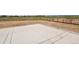 An empty backyard featuring a golf course in the distance at 16002 E 111Th Cir, Commerce City, CO 80022
