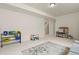 Another view of the bonus room with neutral carpet and space for activities at 16002 E 111Th Cir, Commerce City, CO 80022