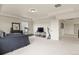 Bright main bedroom suite features a seating area and exercise equipment at 16002 E 111Th Cir, Commerce City, CO 80022