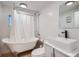 Bright bathroom boasts a standalone tub, a stylish vanity sink, and updated fixtures at 3500 W 55Th Ave, Denver, CO 80221