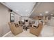 Finished basement with four chairs around a table, and a bar area at 10856 Parker Vista Ln, Parker, CO 80138