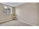 Carpeted bedroom featuring a window with views of the landscape and decor at 861 Circle, Palmer Lake, CO 80133