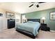 Comfortable bedroom featuring neutral colors and furniture with a scenic view at 3661 S Perth Cir # 6-101, Aurora, CO 80013